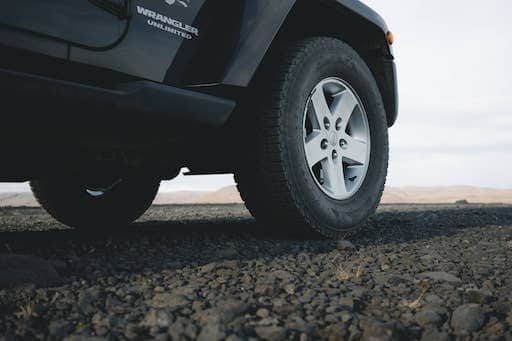 luxury car wheel on gravel iceland